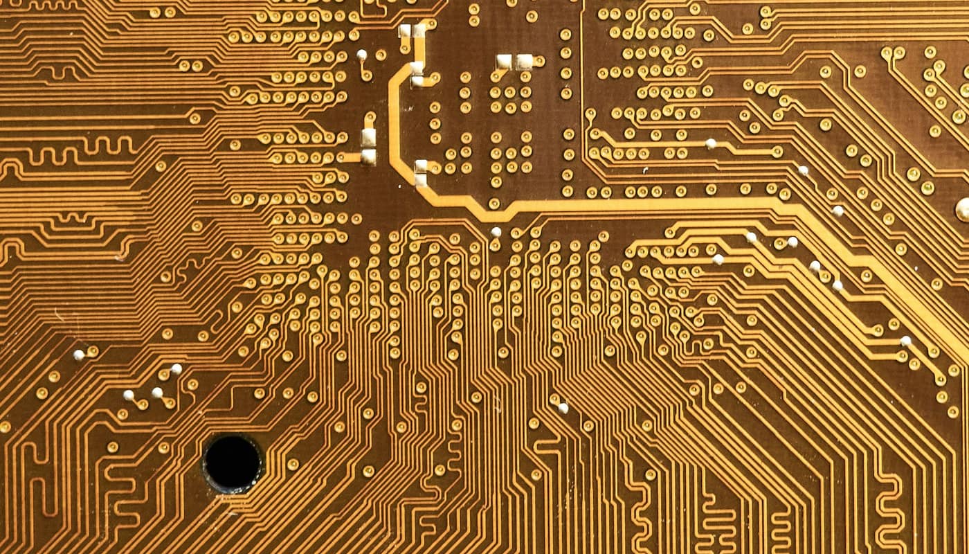 A circuit board with gold-coloured traces