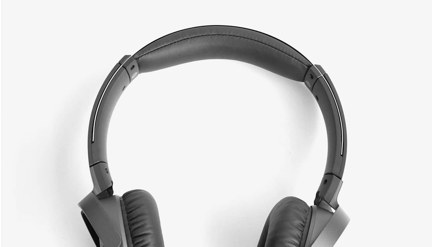 Black over-ear headphones against a white background